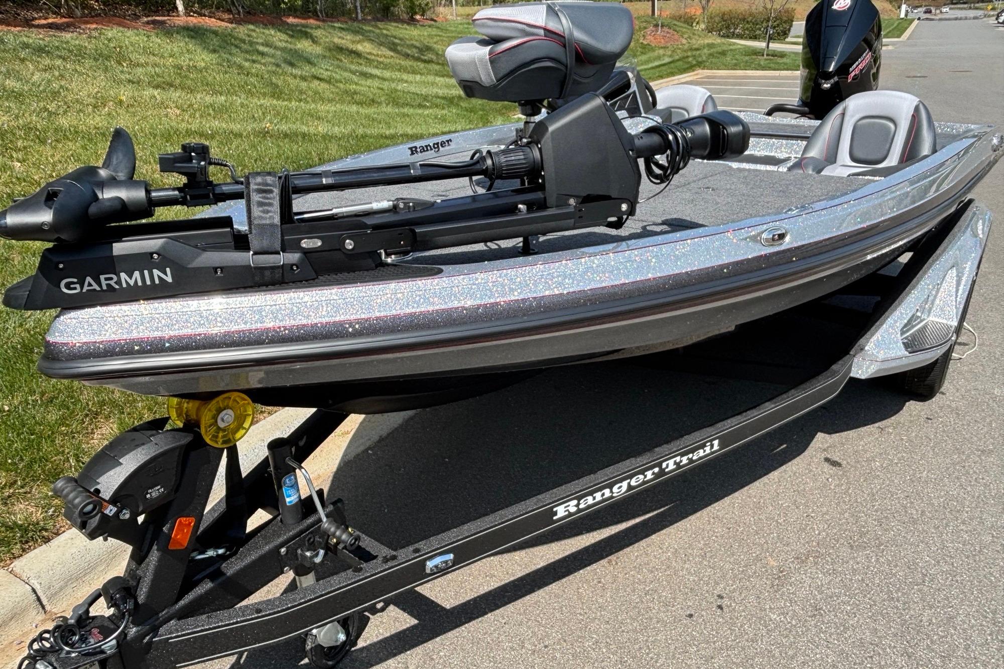 2026 Ranger Z518 Cup-Equipped boat on trailer with Garmin equipment, parked outdoors.