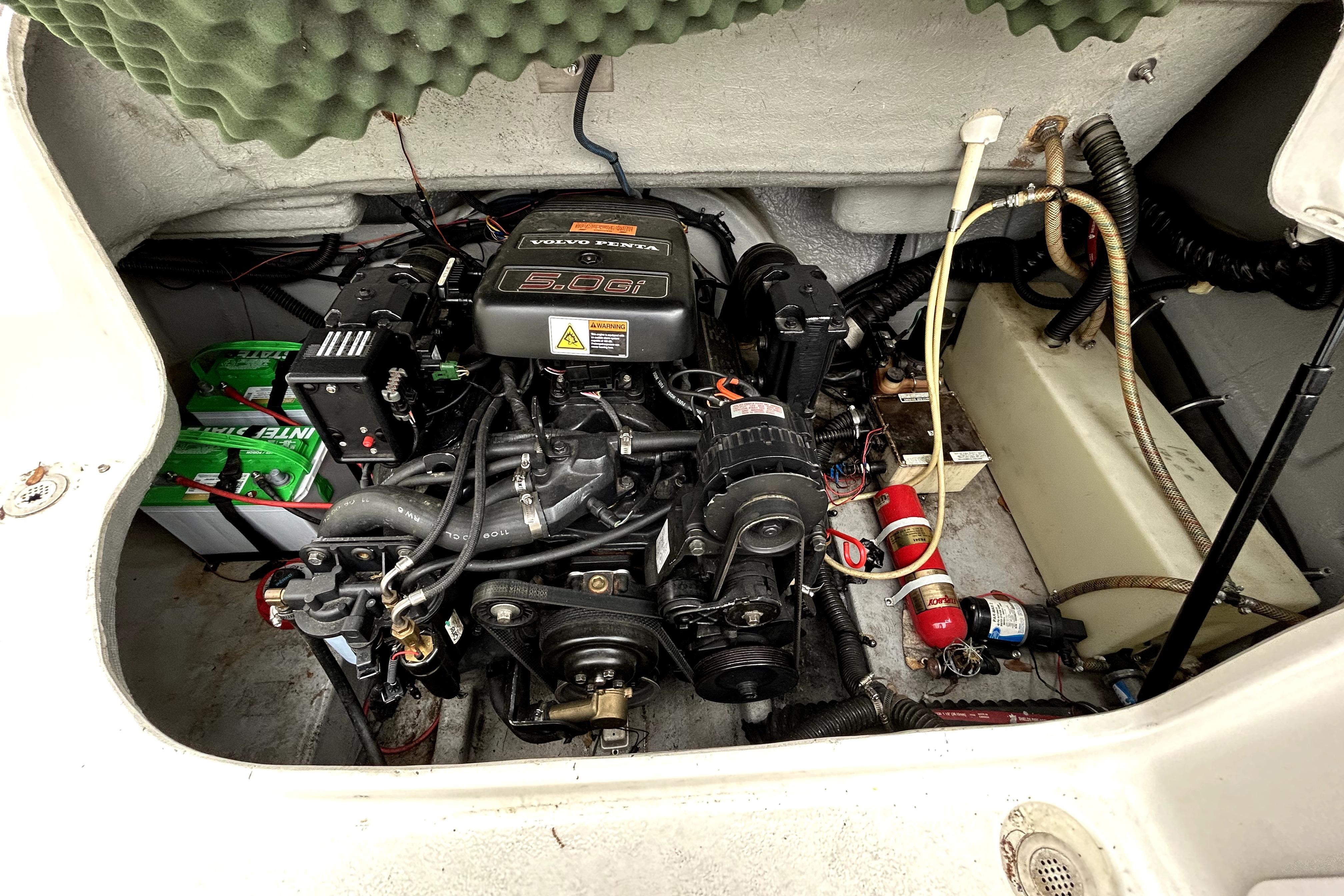 Engine compartment of a 2001 Crownline 239 DB boat with Volvo Penta 5.0Gi engine.