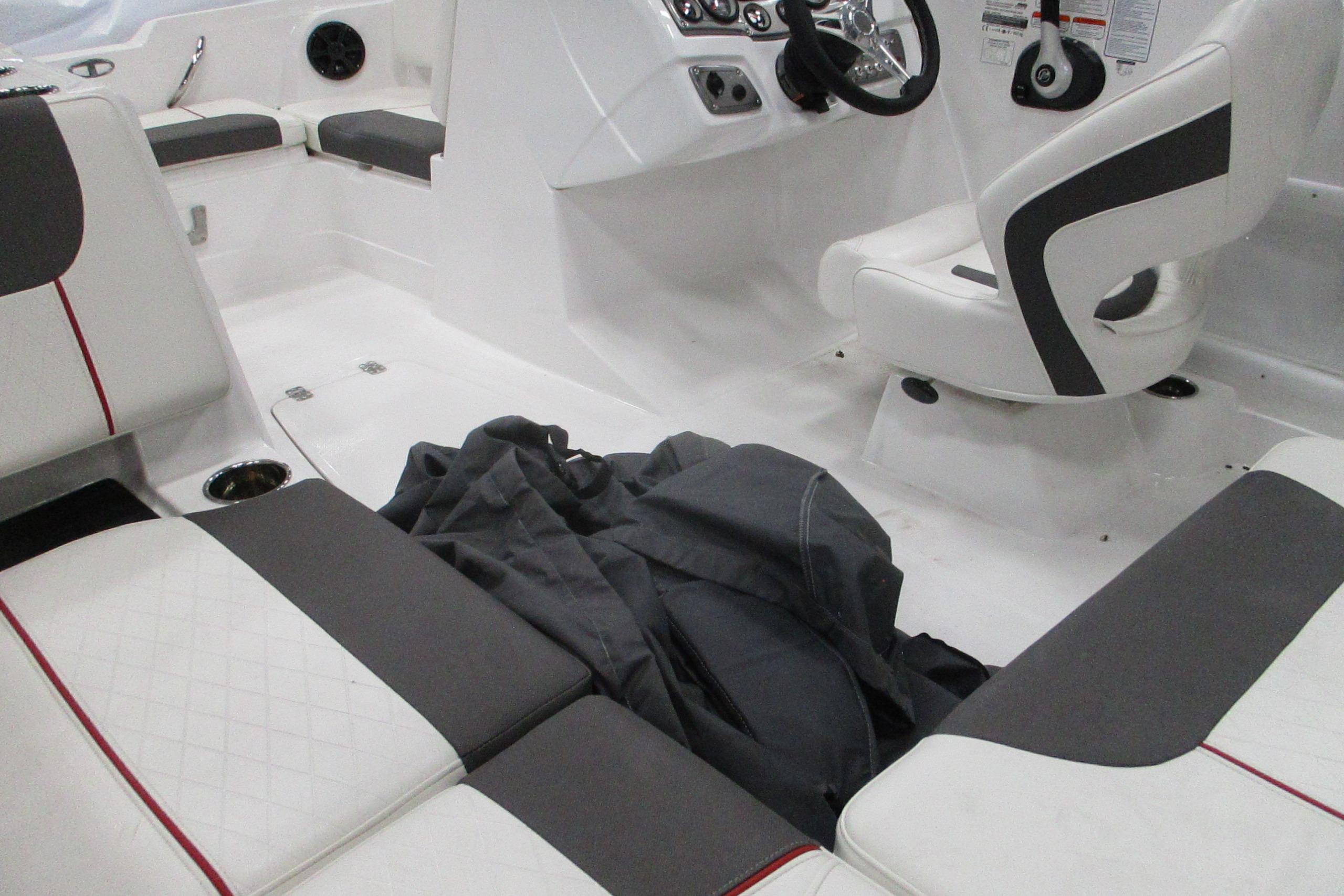 Interior of 2024 Tahoe 1950 boat with white and gray seating.