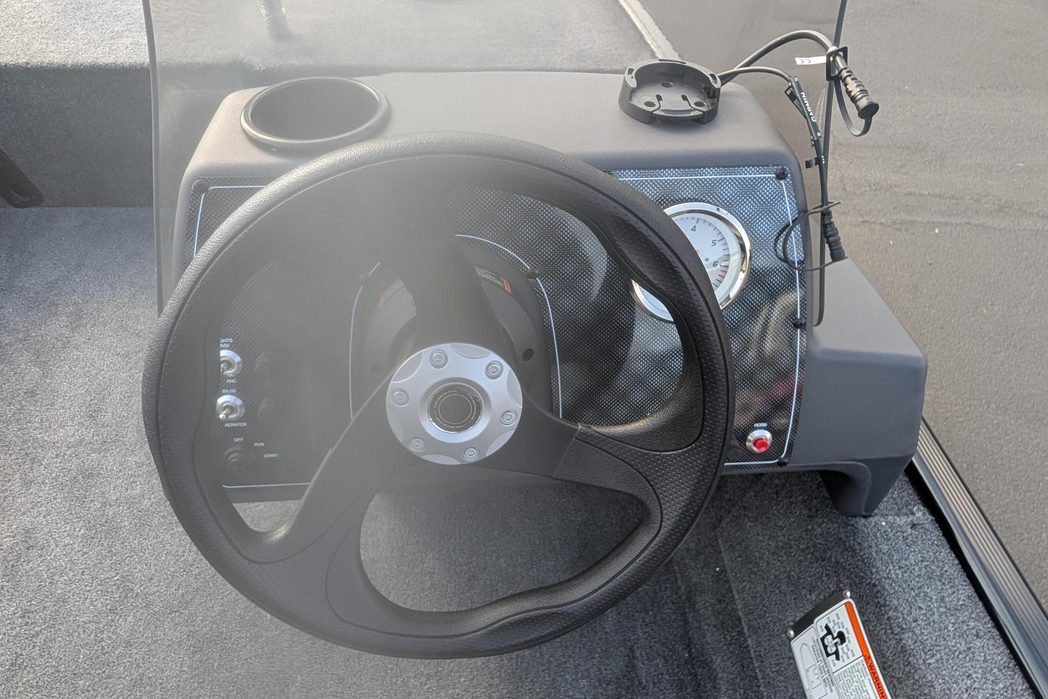 Steering wheel and dashboard of 2026 Tracker Bass Tracker Classic XL boat.