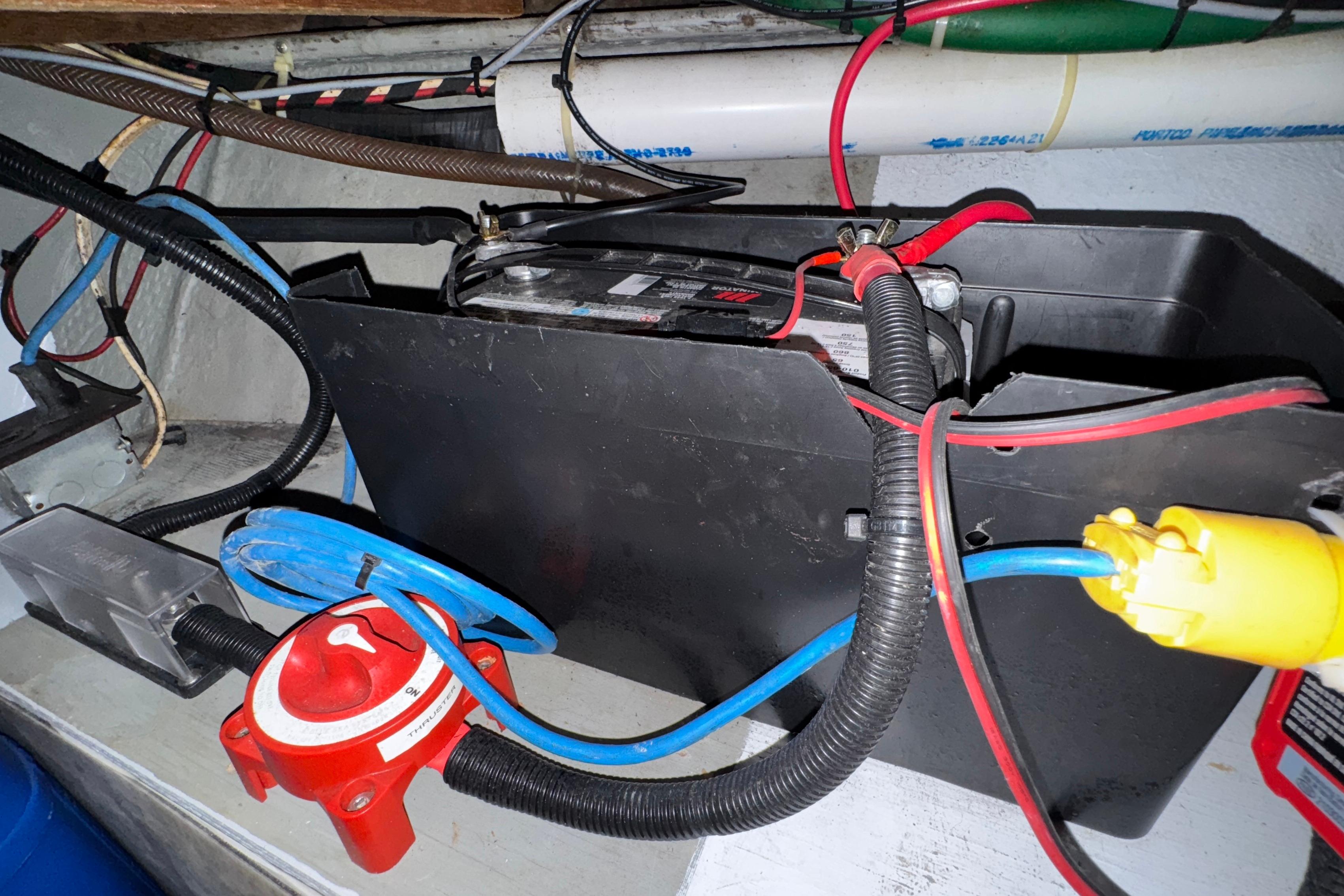 Thruster battery in floor storage
