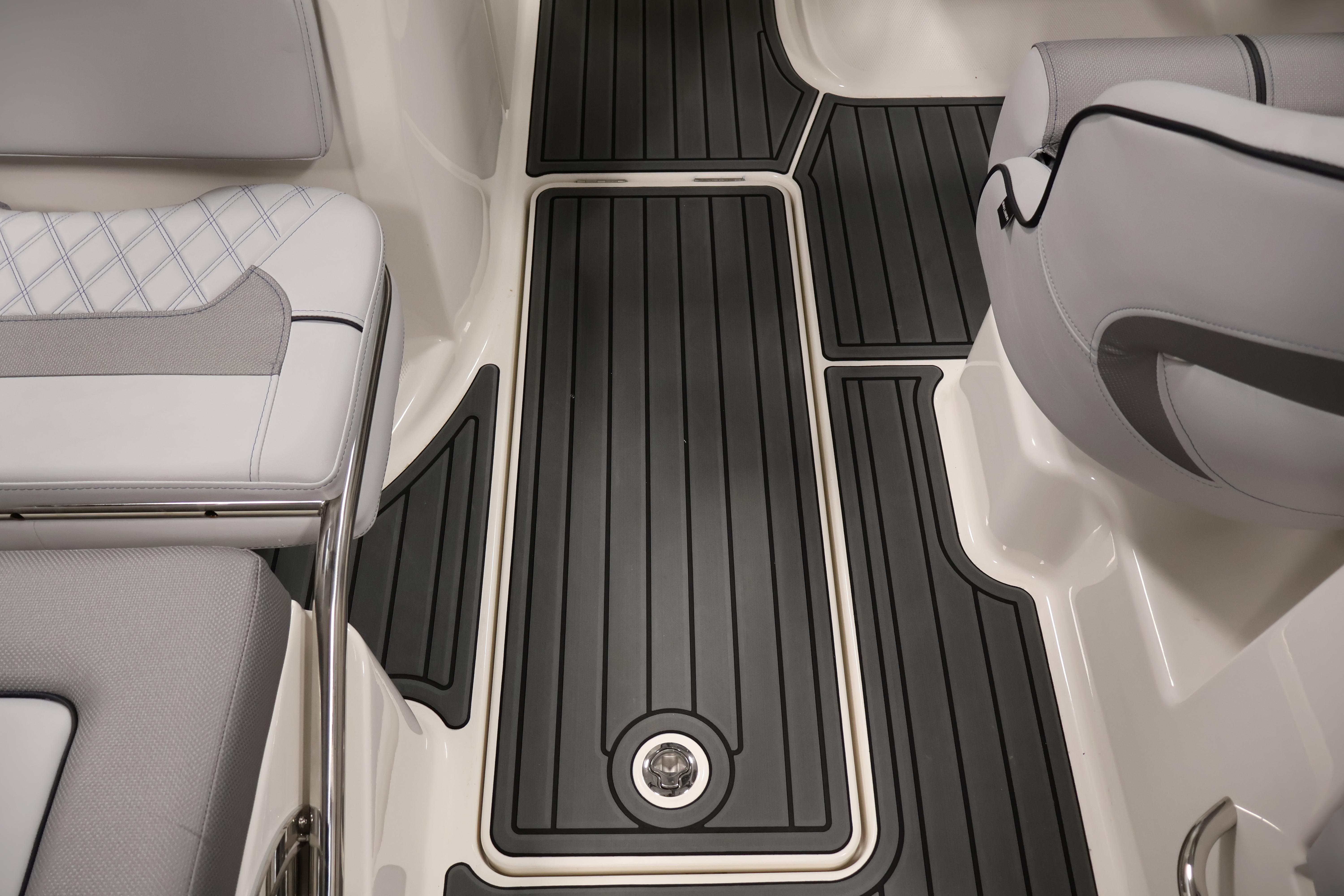 2026 Bayliner VR6 Bowrider I/O interior with sleek seating and non-slip flooring.
