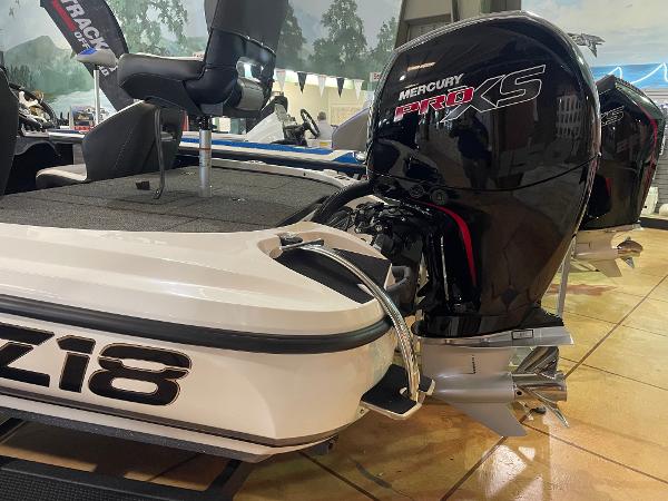 2025 Nitro Z18 Pro boat with Mercury Pro XS engine displayed indoors.