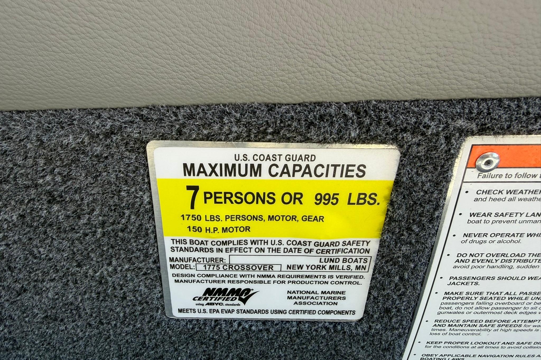 U.S. Coast Guard capacity label for Lund 1775 Crossover XS, 2027 model, 7 persons or 995 lbs.