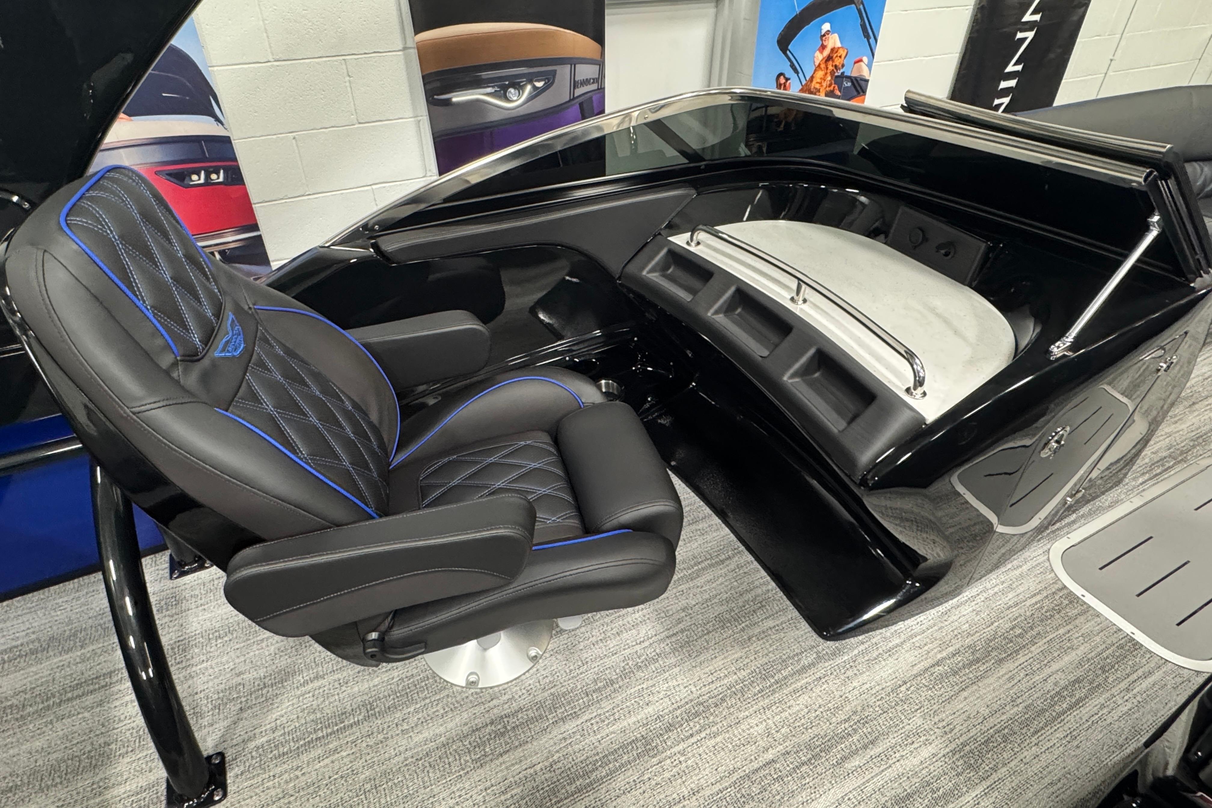 Luxurious interior of 2026 Bennington 25 QSBWASE boat with sleek black seating.