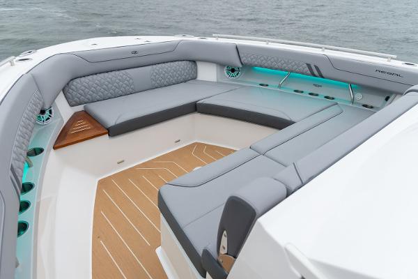 Manufacturer Provided Image: Luxurious seating area on 2026 Regal LX43 boat with elegant gray upholstery.