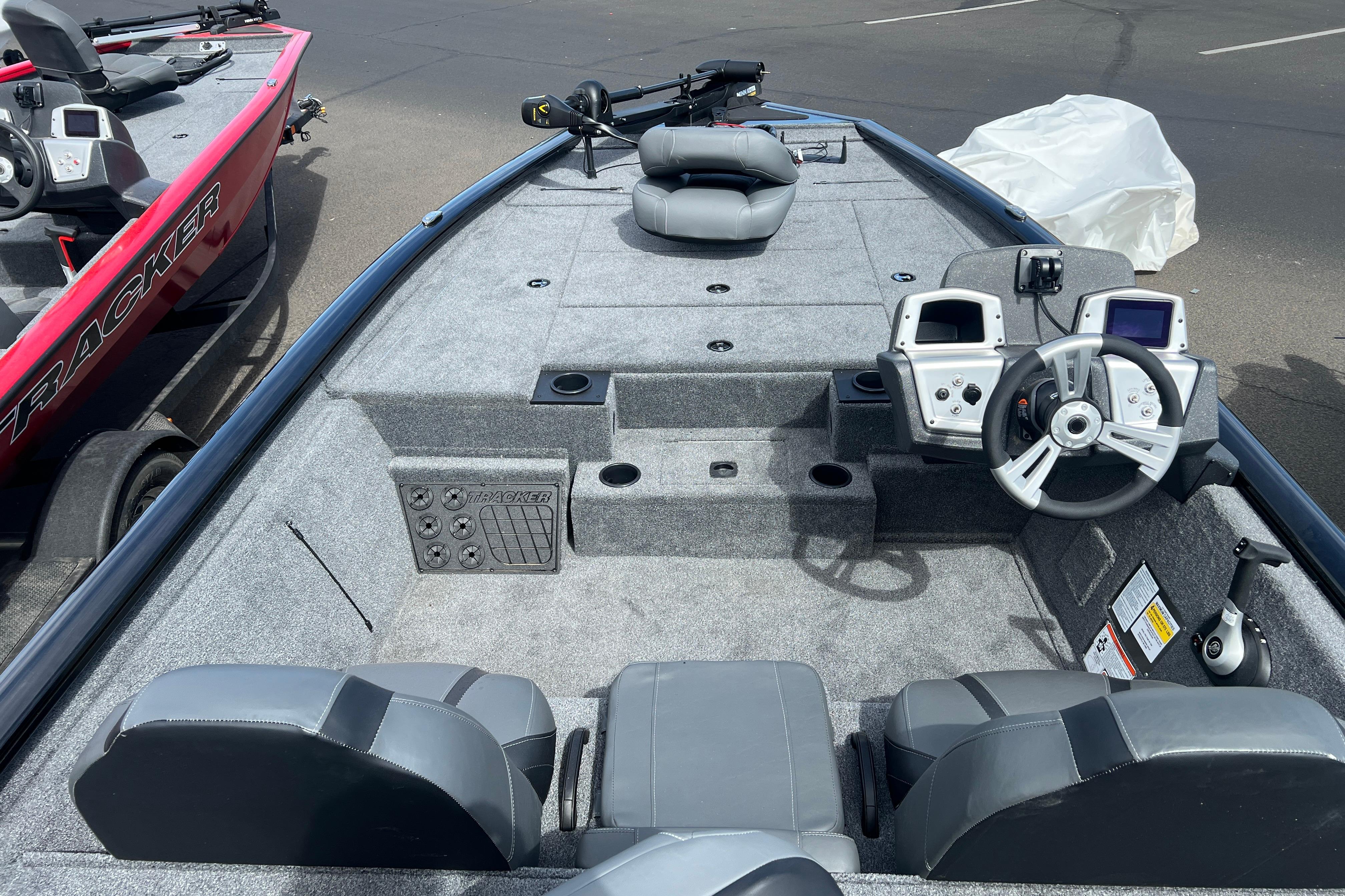 2026 Tracker Pro Team 195 boat interior with steering console and seating.