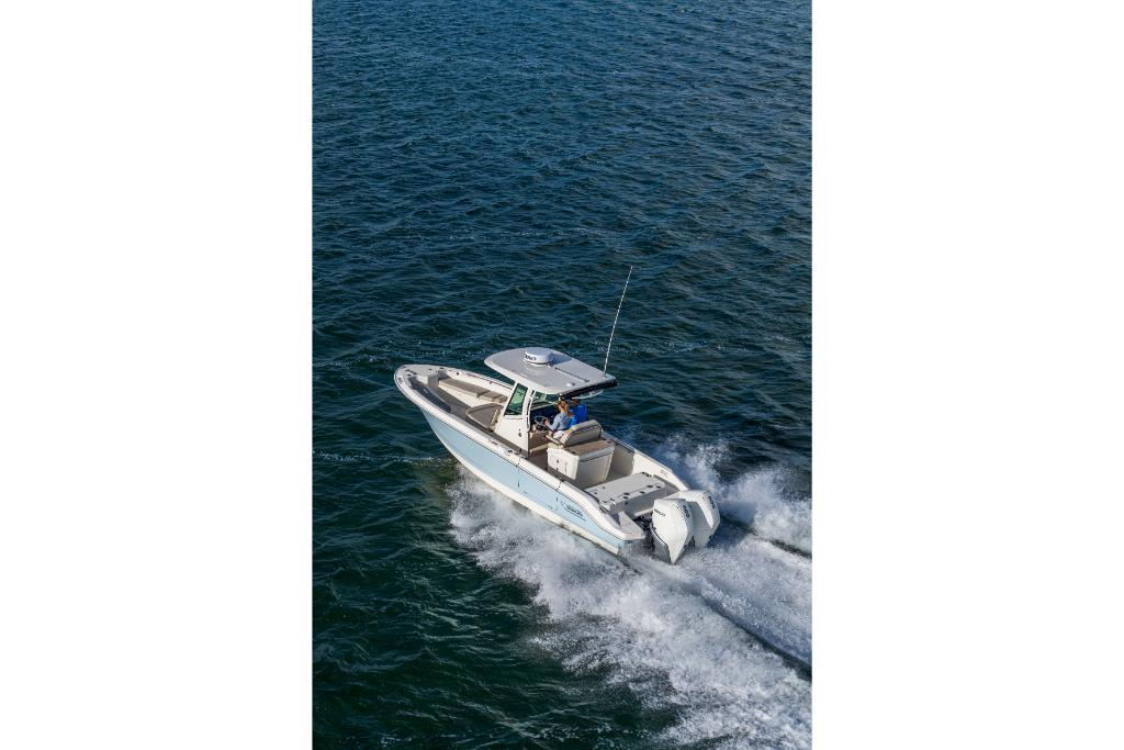 2024 Boston Whaler 280 Dauntless boat cruising on open water.