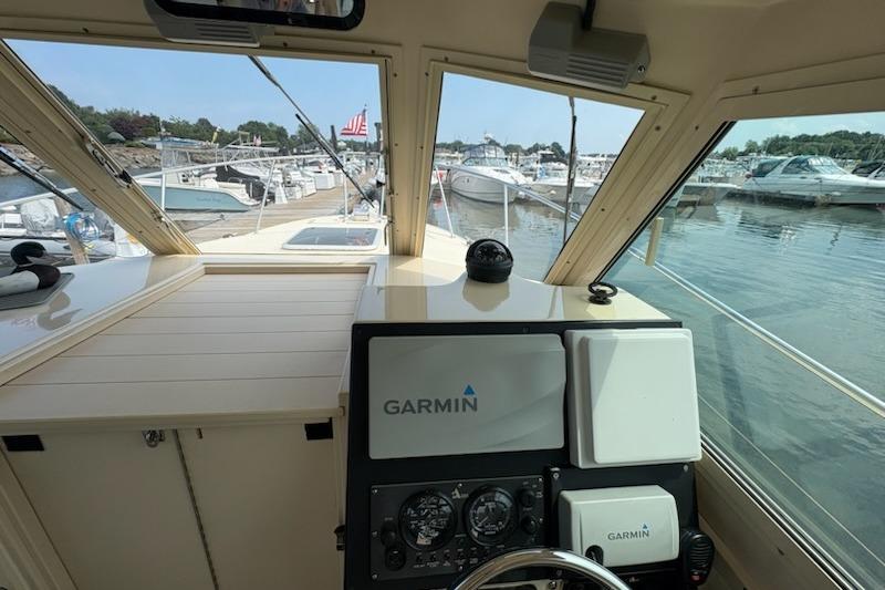 Interior view of 2003 Albin 28 Tournament Express boat with Garmin navigation system.