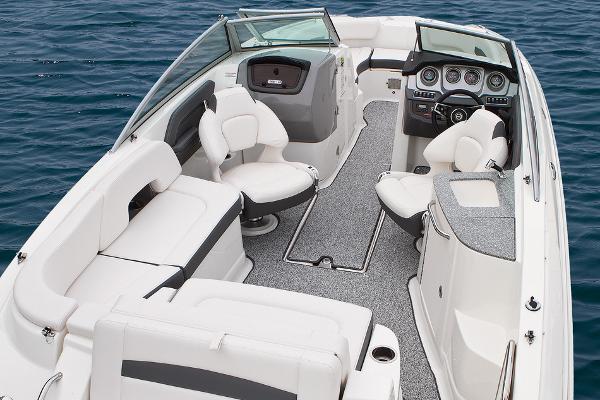 Manufacturer Provided Image: 2016 Chaparral 244 Sunesta boat interior with seating and dashboard on water.