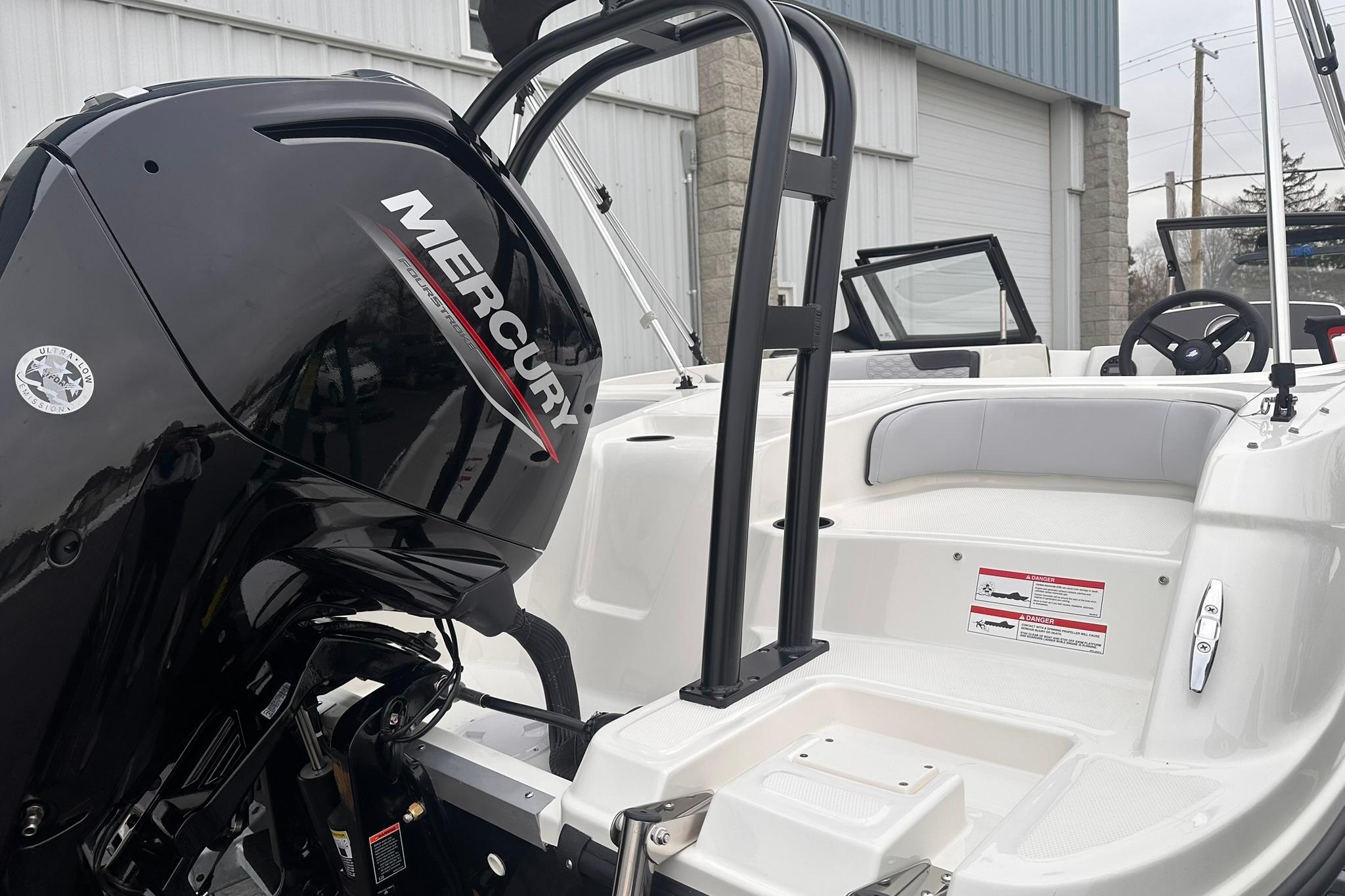 2026 Bayliner M17 boat with Mercury engine, showcasing sleek design and modern features.