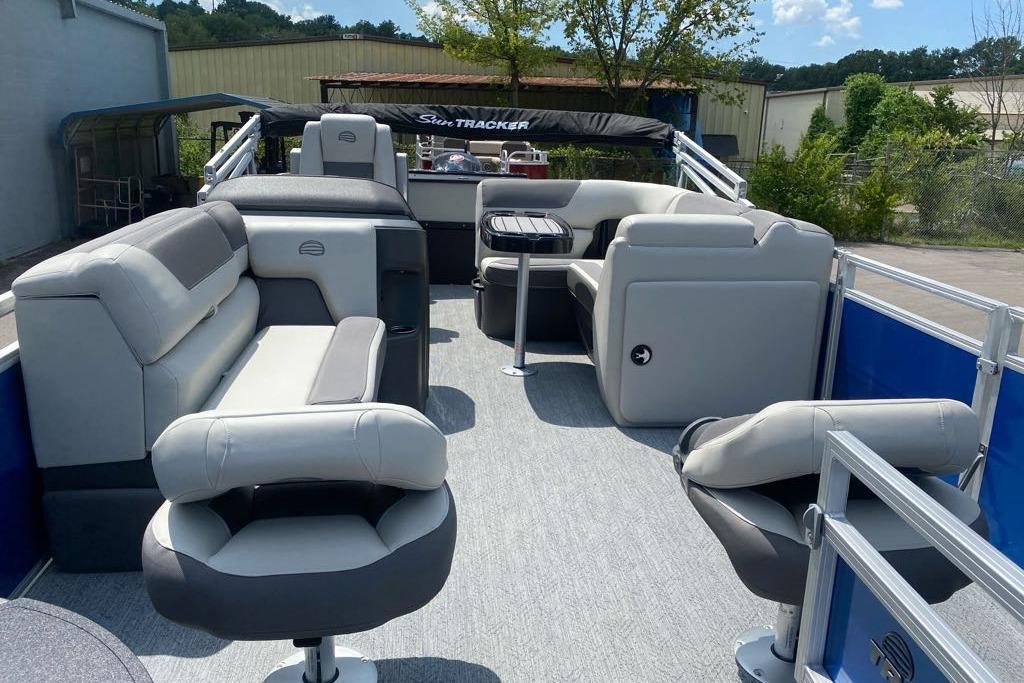 2026 Sun Tracker Fishin' Barge 20 DLX with spacious seating and modern design.