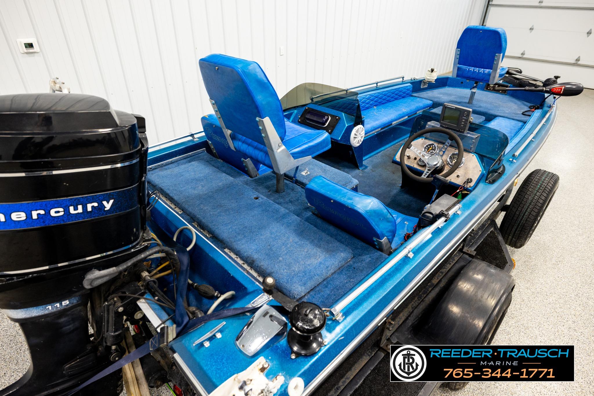 1980 Ranger 175 VS boat with blue interior and Mercury engine in showroom.