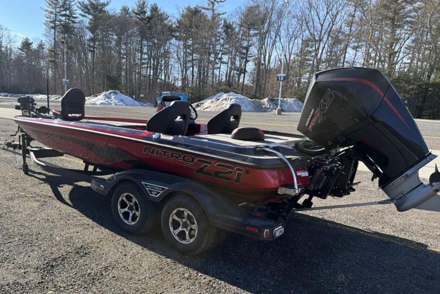 2026 Nitro Z21 XL Pro boat with powerful engine, parked outdoors on a sunny day.