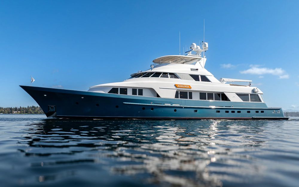 1989 Delta Marine Flybridge Motoryacht on calm water.
