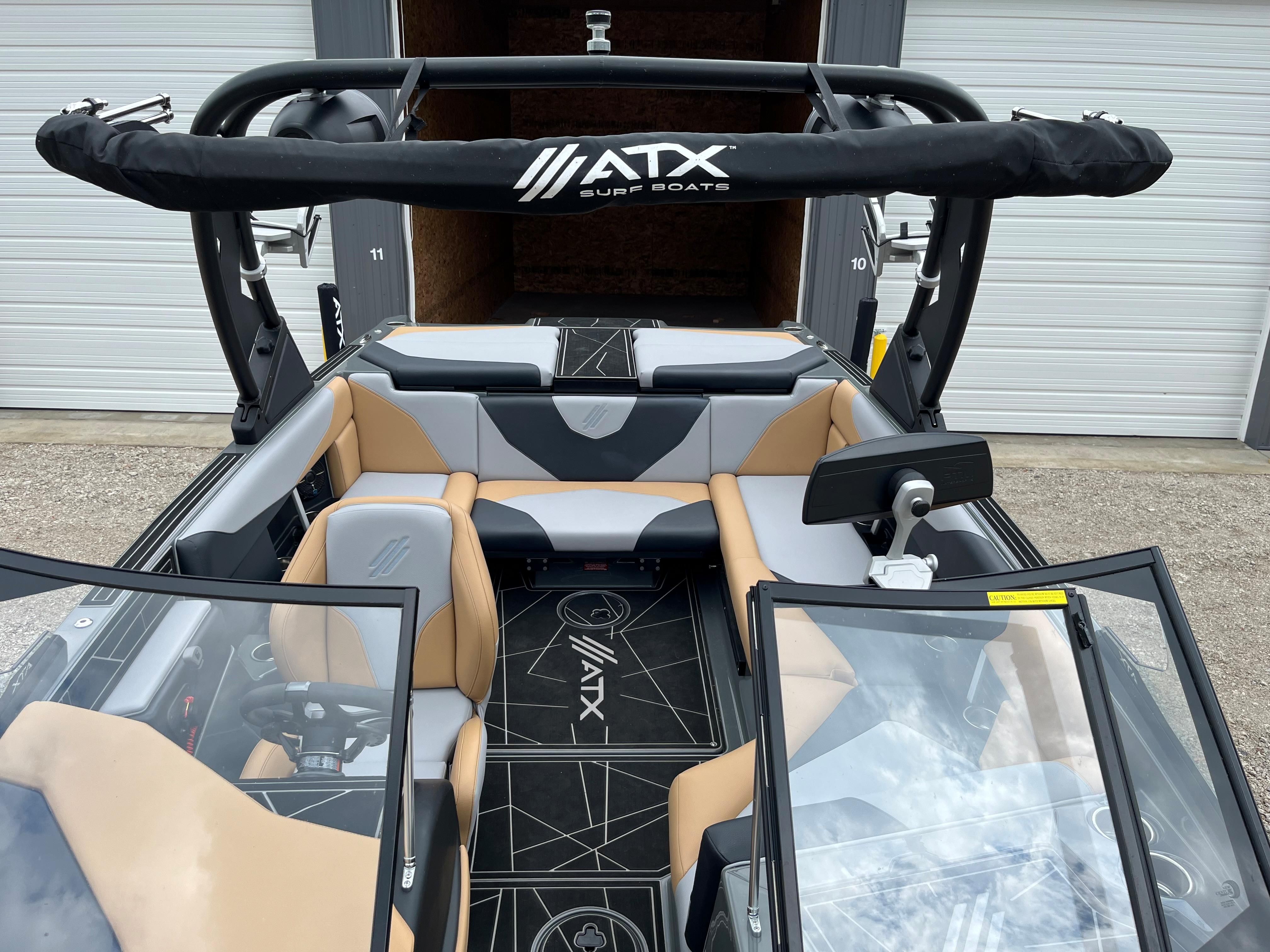 Interior view of a 2022 ATX Surf Boats 22 Type-S with modern seating and controls.