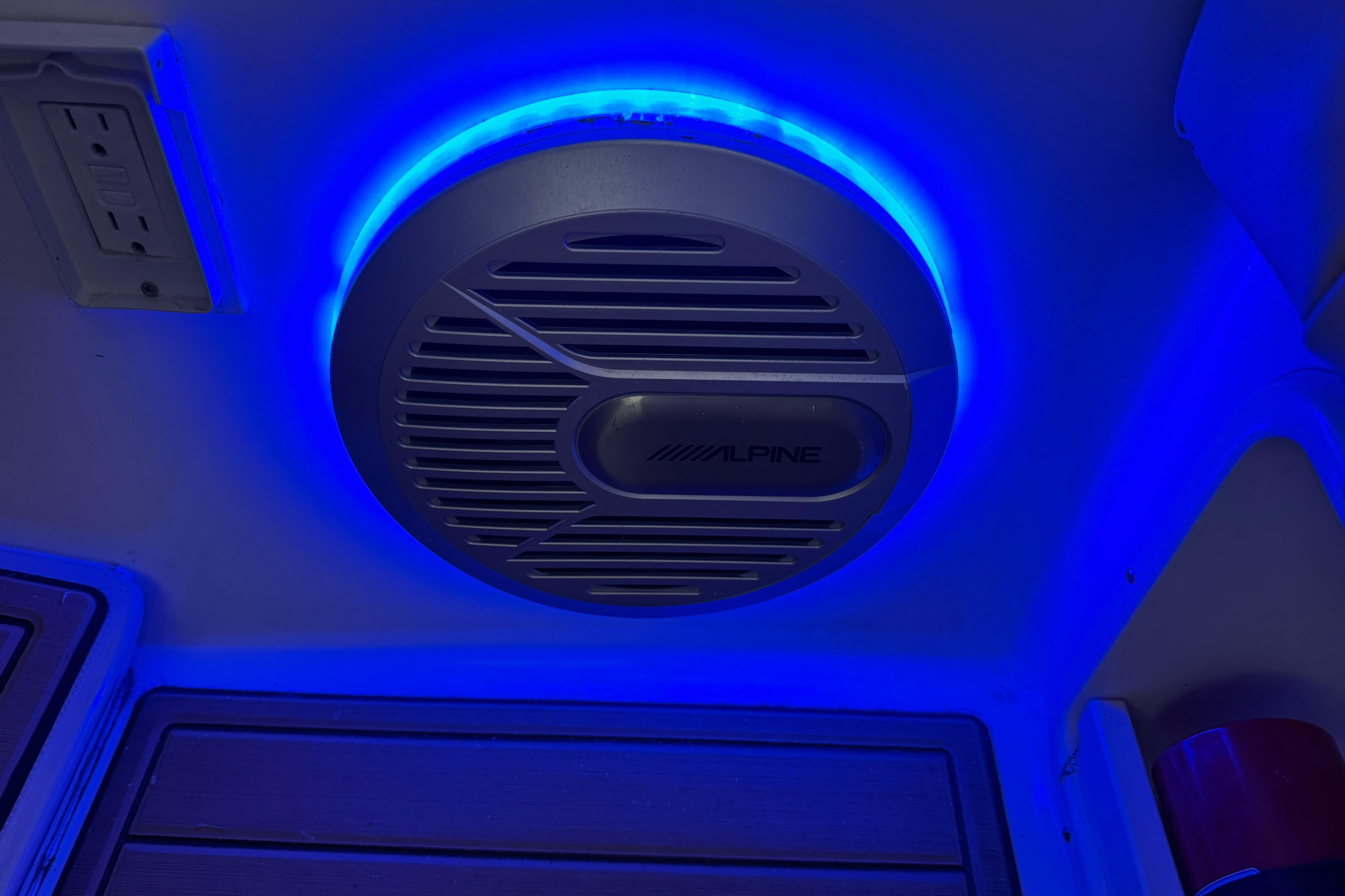Alpine speaker with blue LED lighting in 2006 Chaparral 330 Signature boat interior.