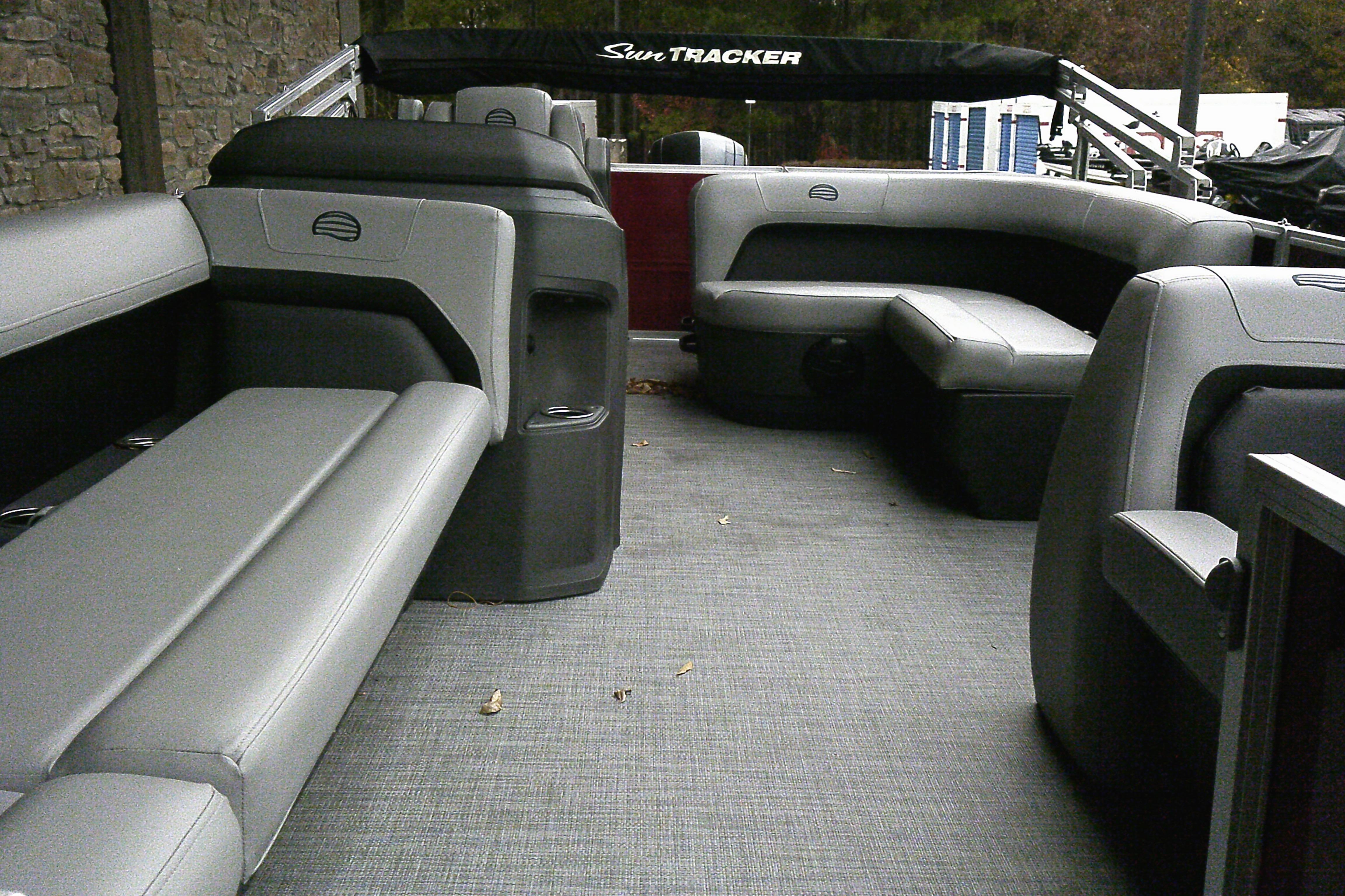 2026 Sun Tracker Party Barge 18 DLX interior with spacious seating and modern design.