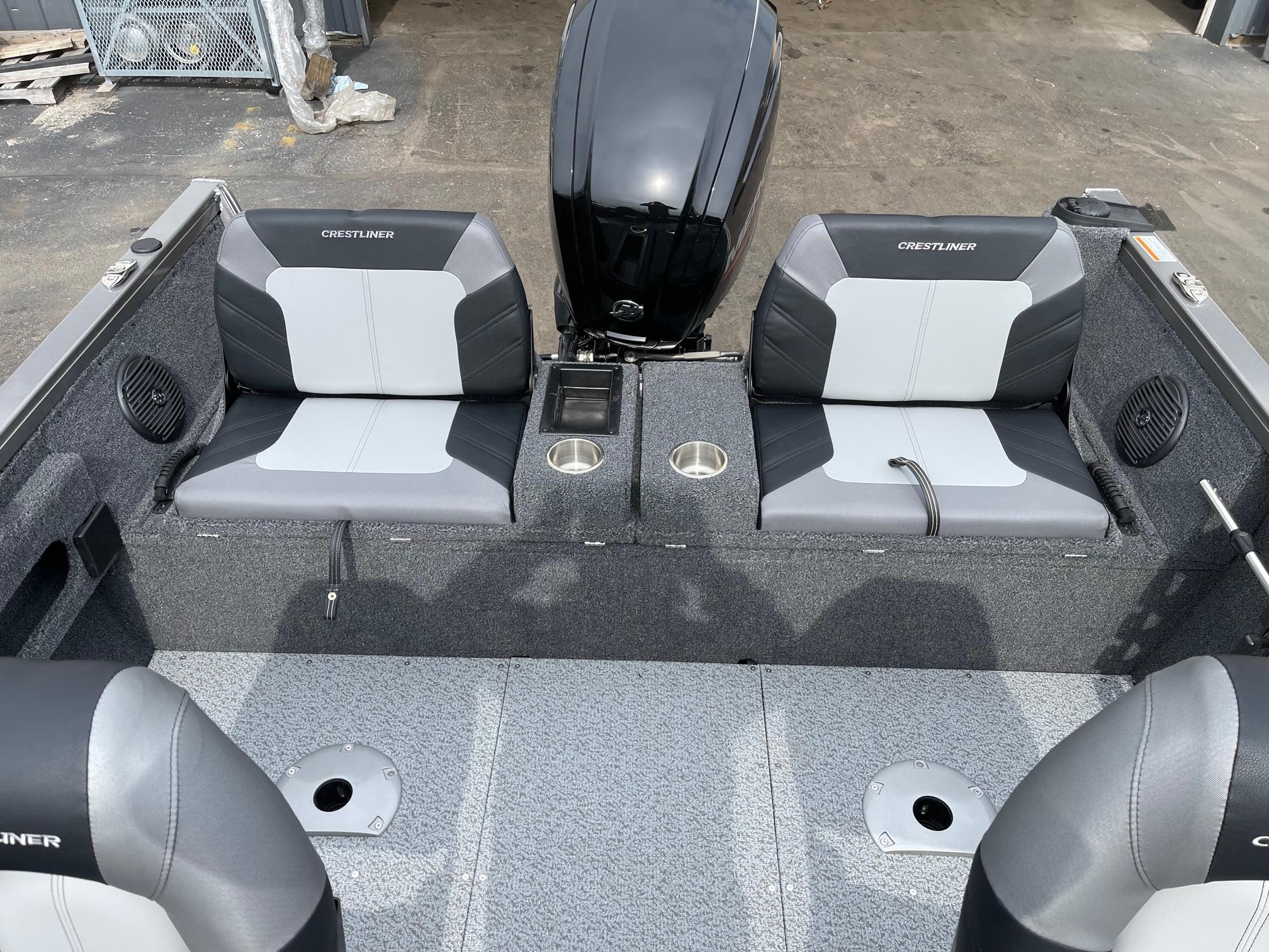 2023 Crestliner 1650 Fish Hawk boat interior with dual seats and motor.