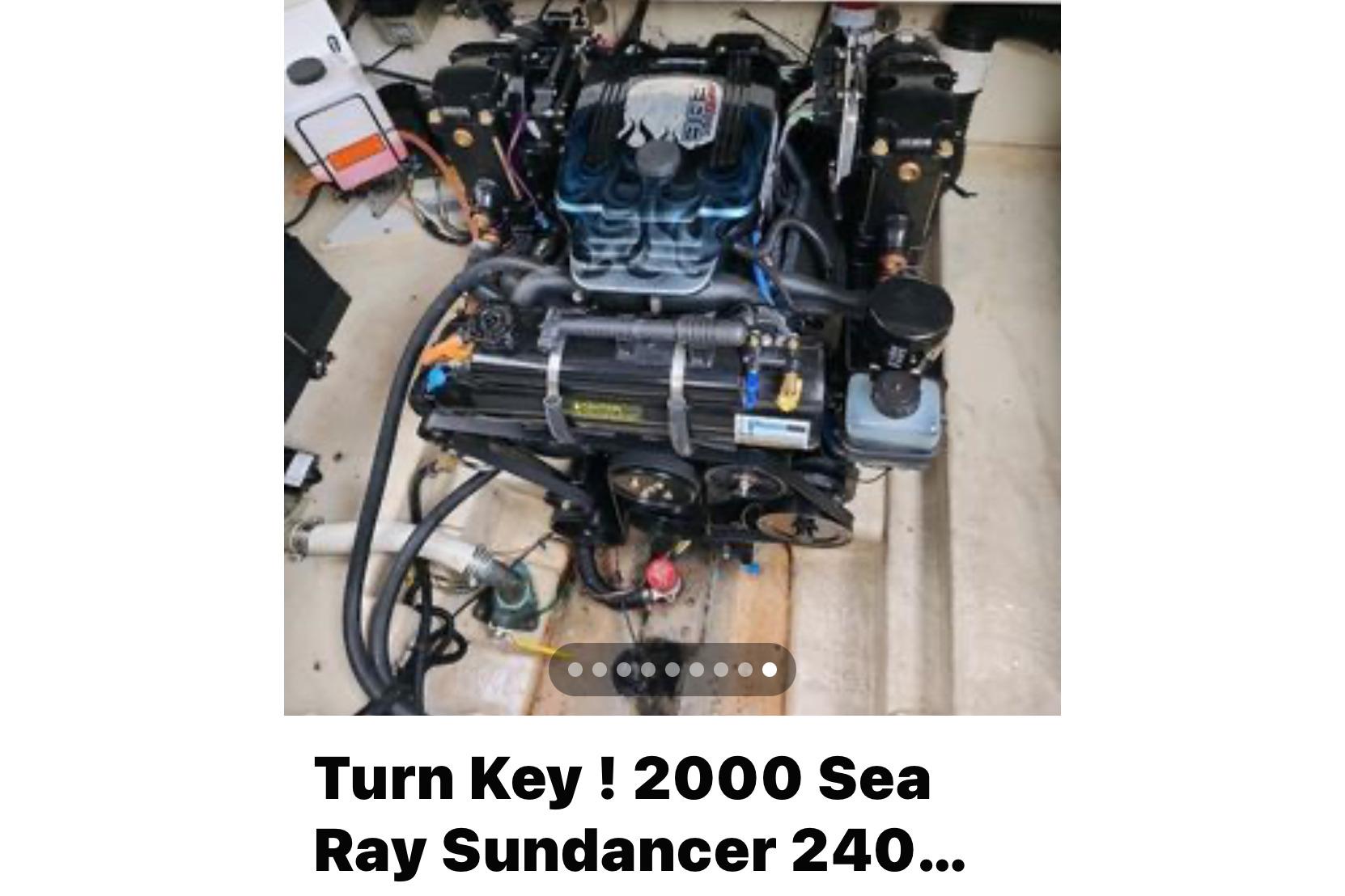 Engine of a 2000 Sea Ray 240 Sundancer boat, detailed view.