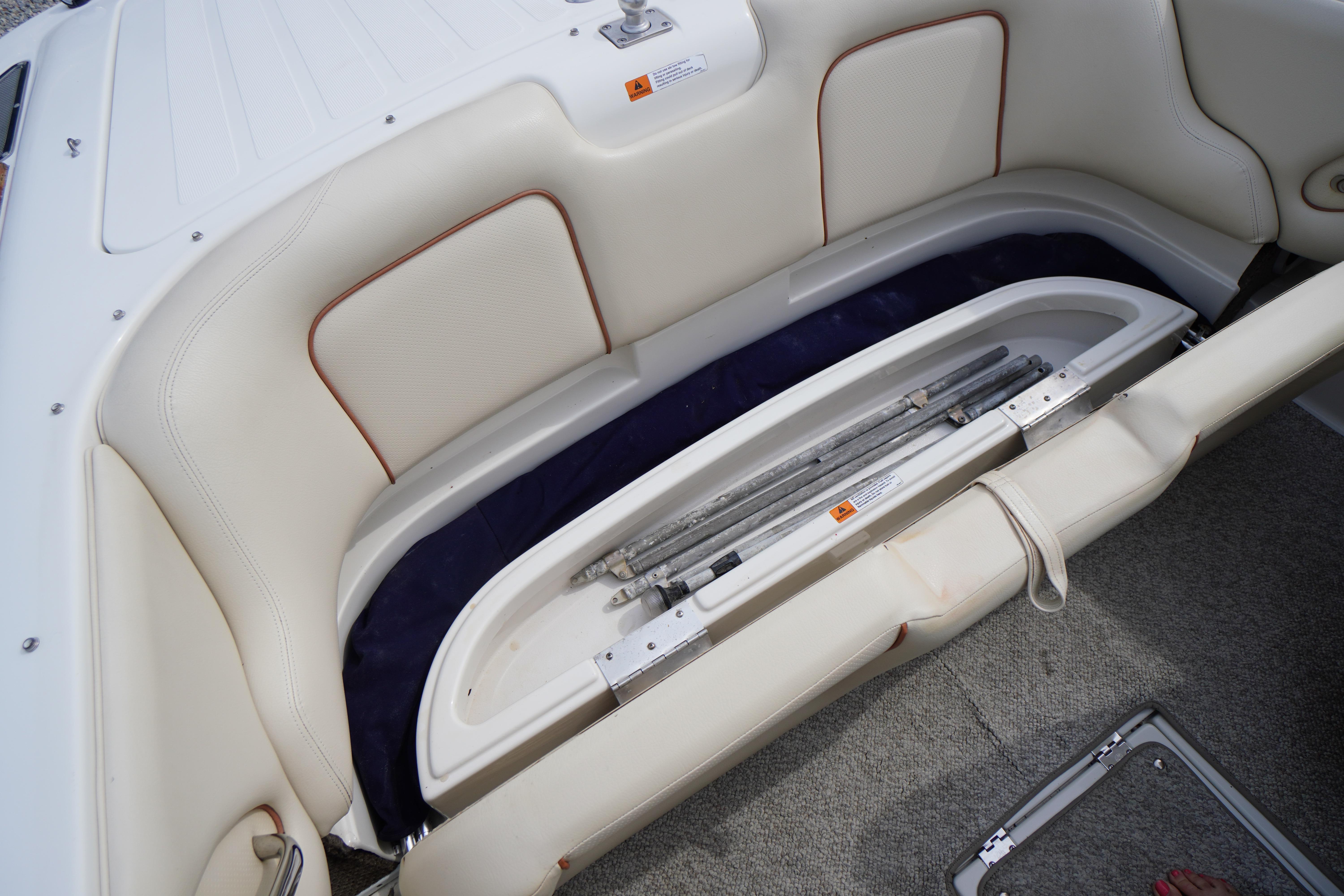 2005 Chris Craft Speedster Heritage boat interior with open storage compartment.