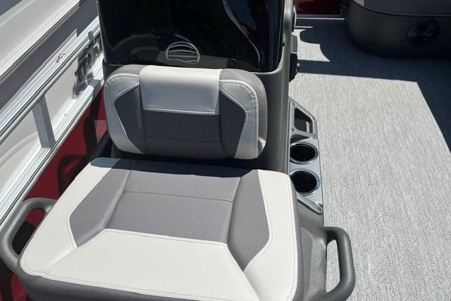 2026 Sun Tracker Bass Buggy 16 XL Select boat seat with cup holders.