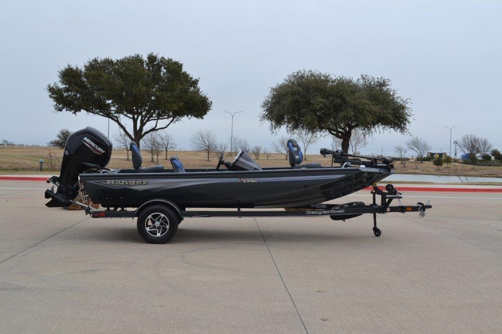 2026 Ranger RT178C boat on trailer, parked outdoors with trees in background.
