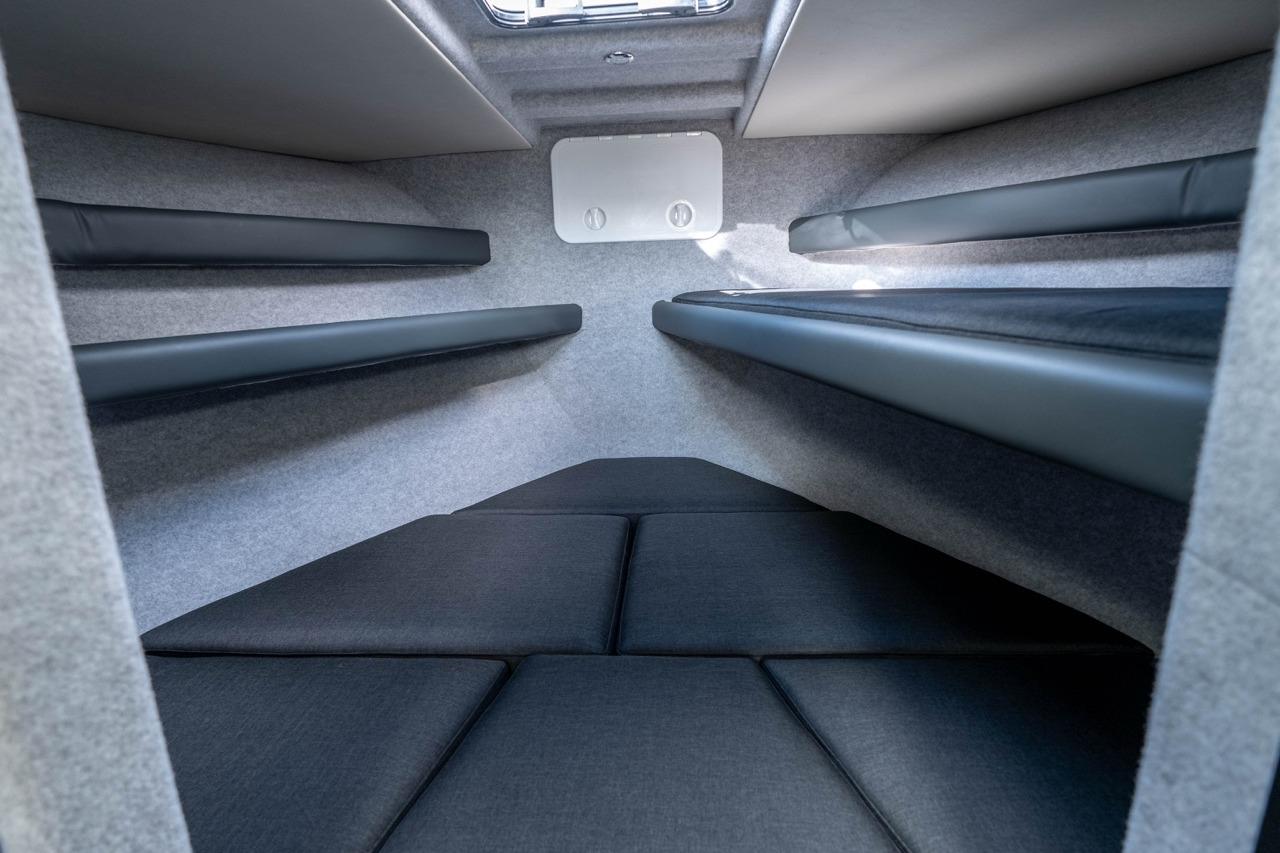 Interior cabin of 2025 Makaira Gen 3 36 boat with cushioned seating.