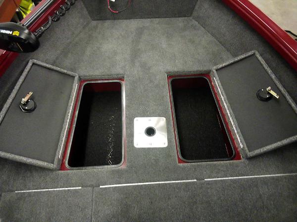 Interior of 2025 Ranger VS1665 SC boat with open storage compartments.