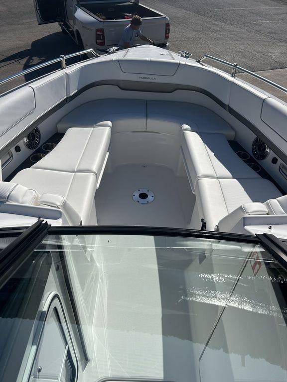 2025 Formula 310 Bowrider boat with spacious seating and sleek design.
