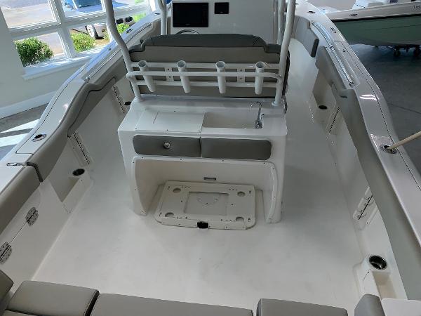 2024 Key West 263 FS boat interior with seating and storage compartments.