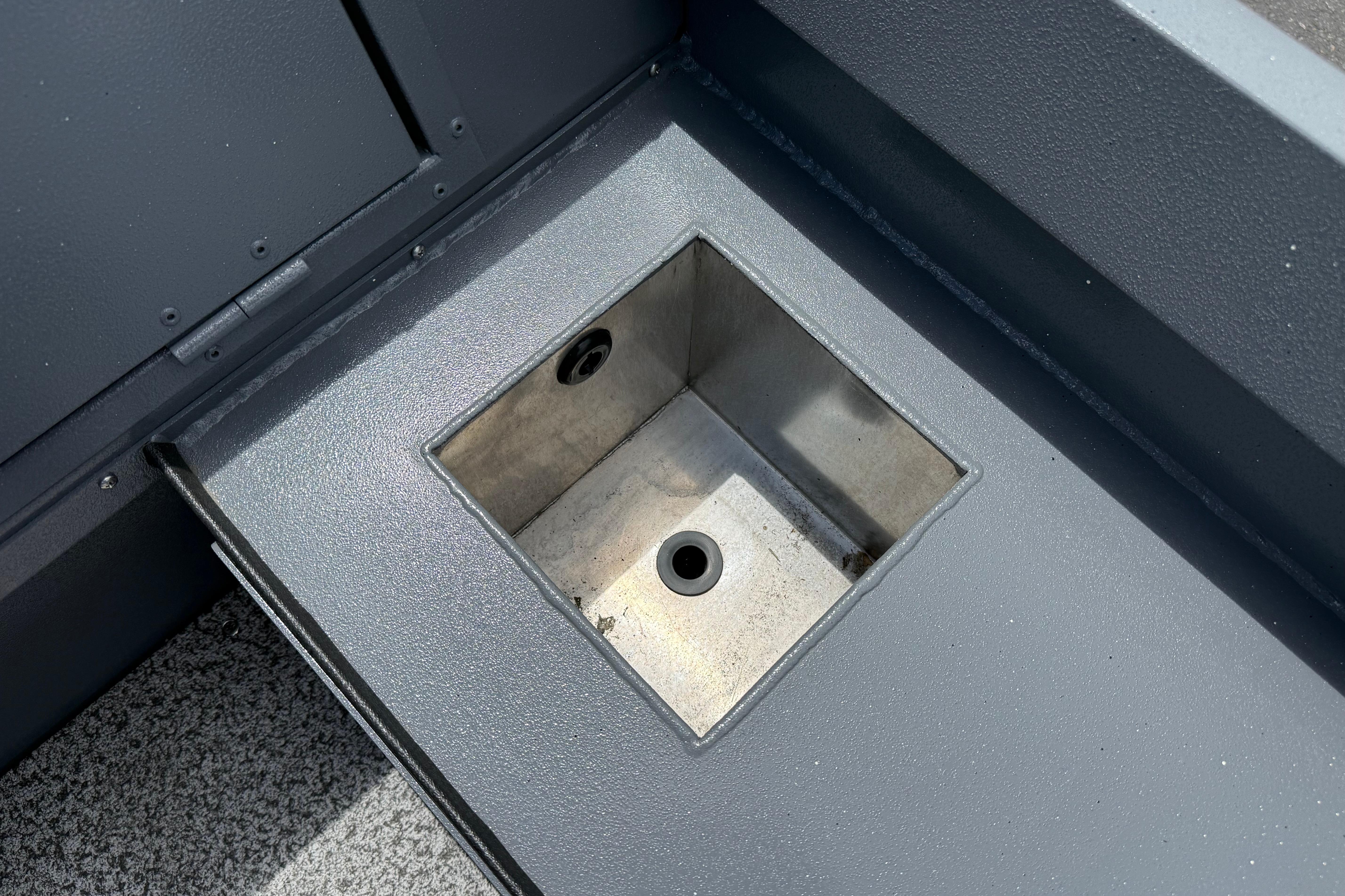 2026 Alumaweld Free Drifter 20 boat interior detail, featuring a built-in compartment.