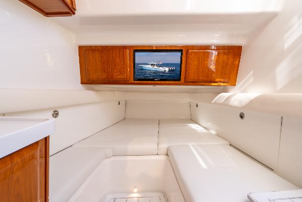 Luxurious interior cabin of 2020 HCB 53 Sueños boat with wooden accents.