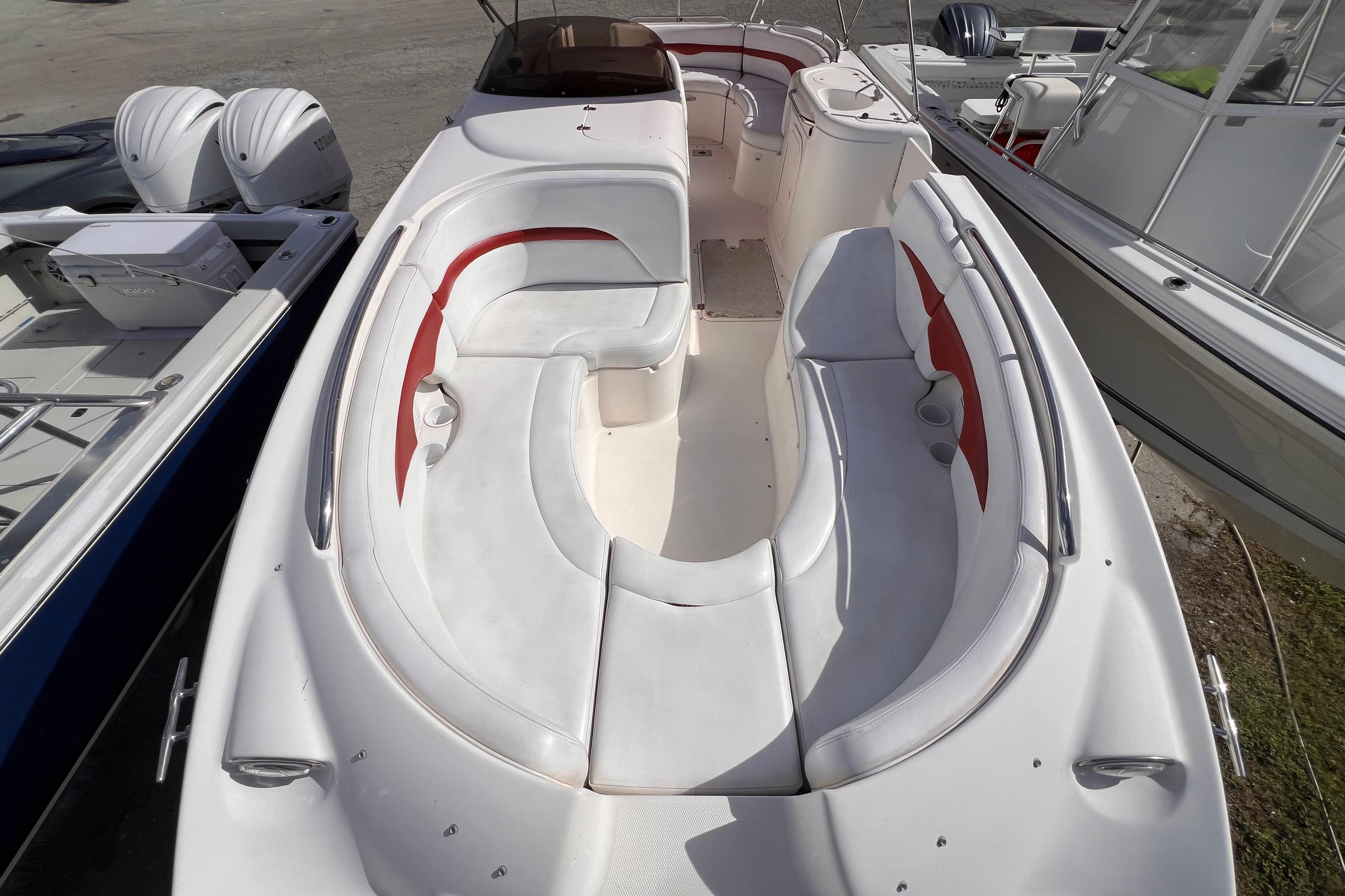 2002 Chaparral 232 Sunesta boat with spacious seating and sleek design.