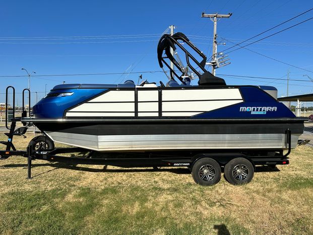 Montara 25' SURF BOSS 2.0 boat, 2023 model, on trailer.