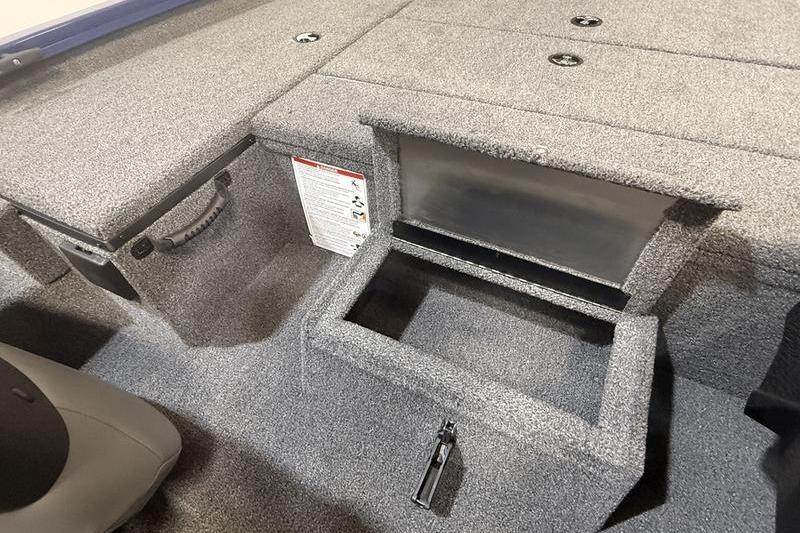 2026 Lowe Stinger 175C boat interior with open storage compartment.