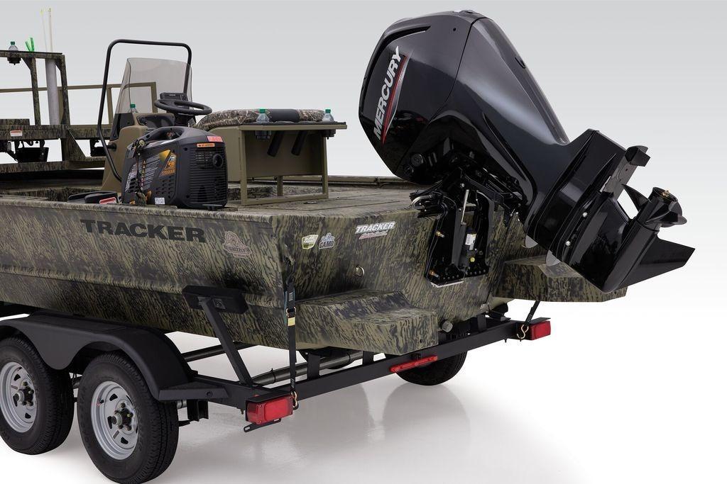 2026 Tracker GRIZZLY® 2072 CC Sportsman boat with Mercury outboard motor on trailer.