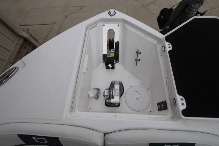 Bow anchor compartment of 2026 Sea Fox 268 Traveler boat, featuring winch and storage.