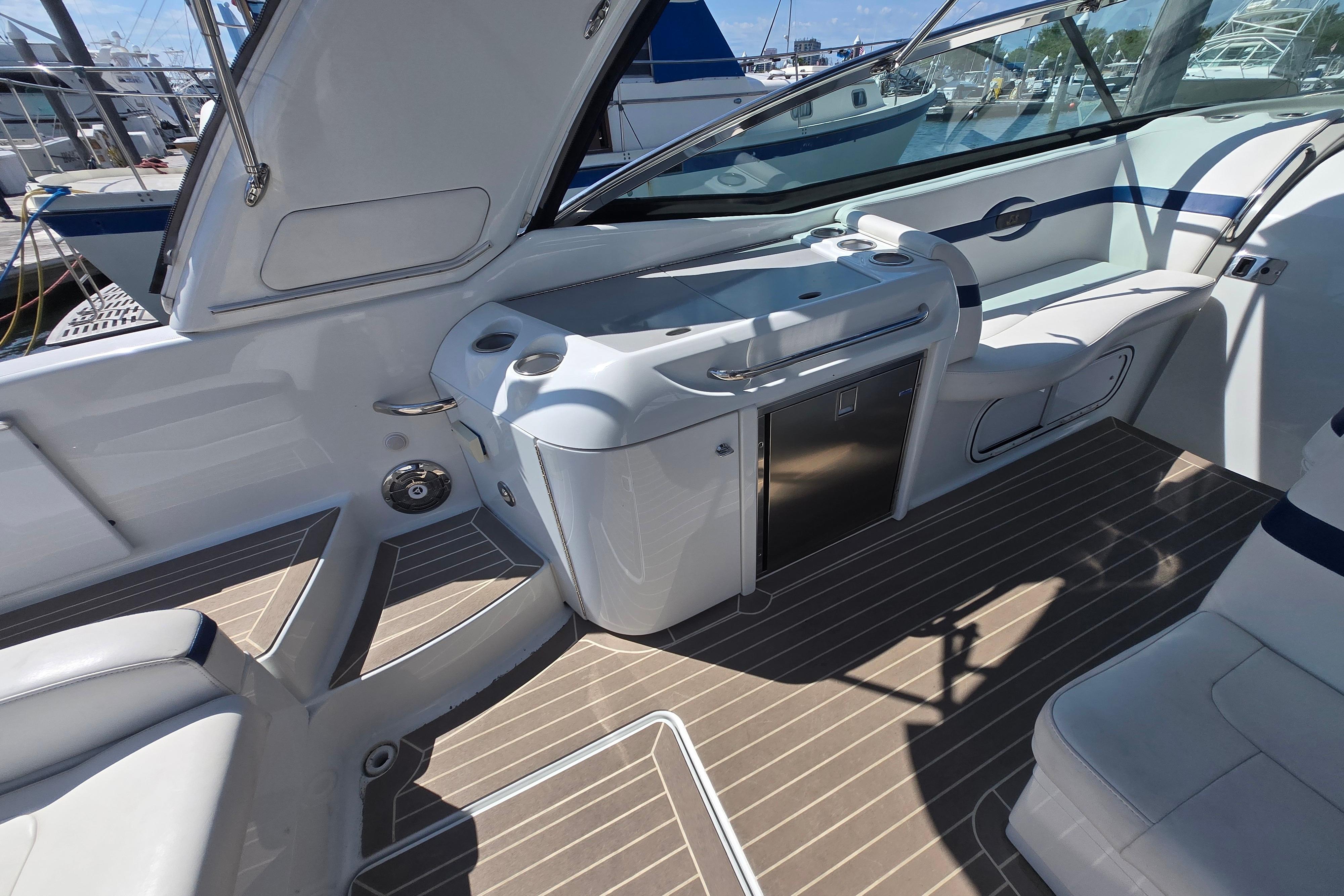Interior of a 2011 Formula 350 Sun Sport boat with sleek seating and modern amenities.