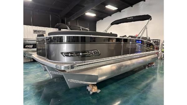 2025 Tahoe Pontoon Cascade Cruise Rear Bench in showroom, sleek design, metallic finish.