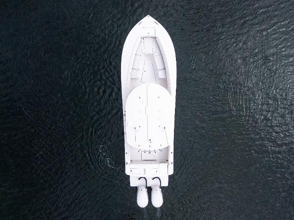 Aerial view of a 2025 Regulator 28 boat on calm water.