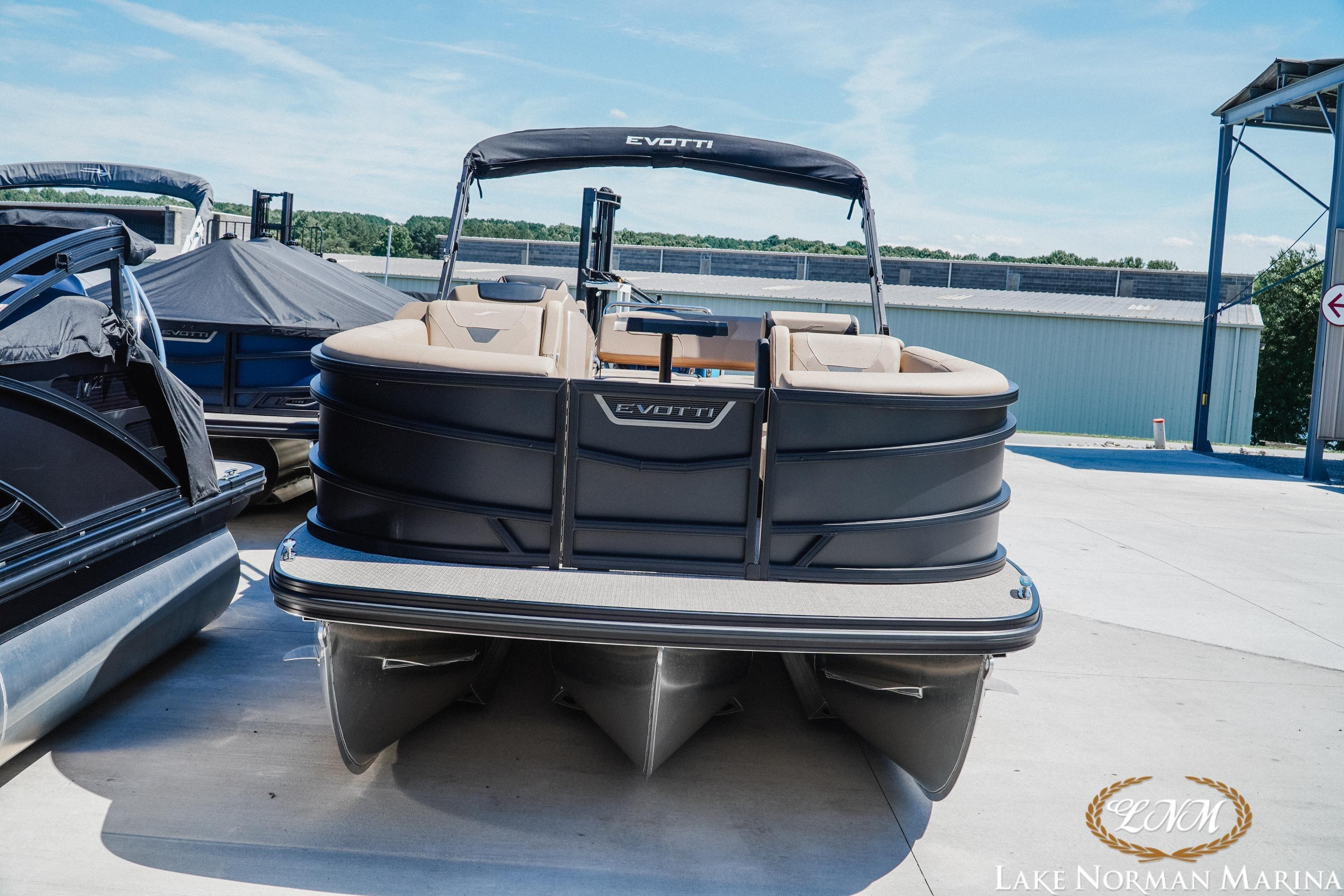 2026 Evotti 523CS pontoon boat at Lake Norman Marina, featuring sleek design and spacious seating.