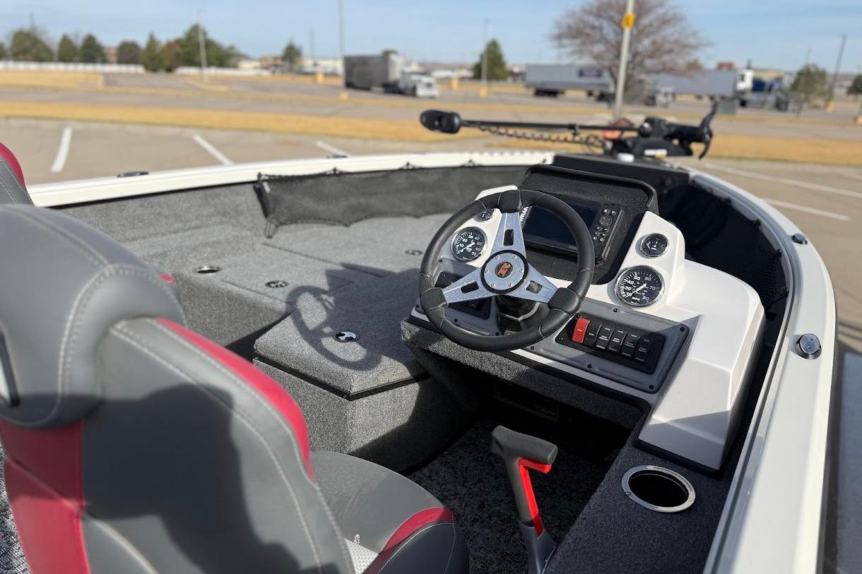 2026 Ranger VS1882SC Reata boat cockpit with steering wheel and control panel.