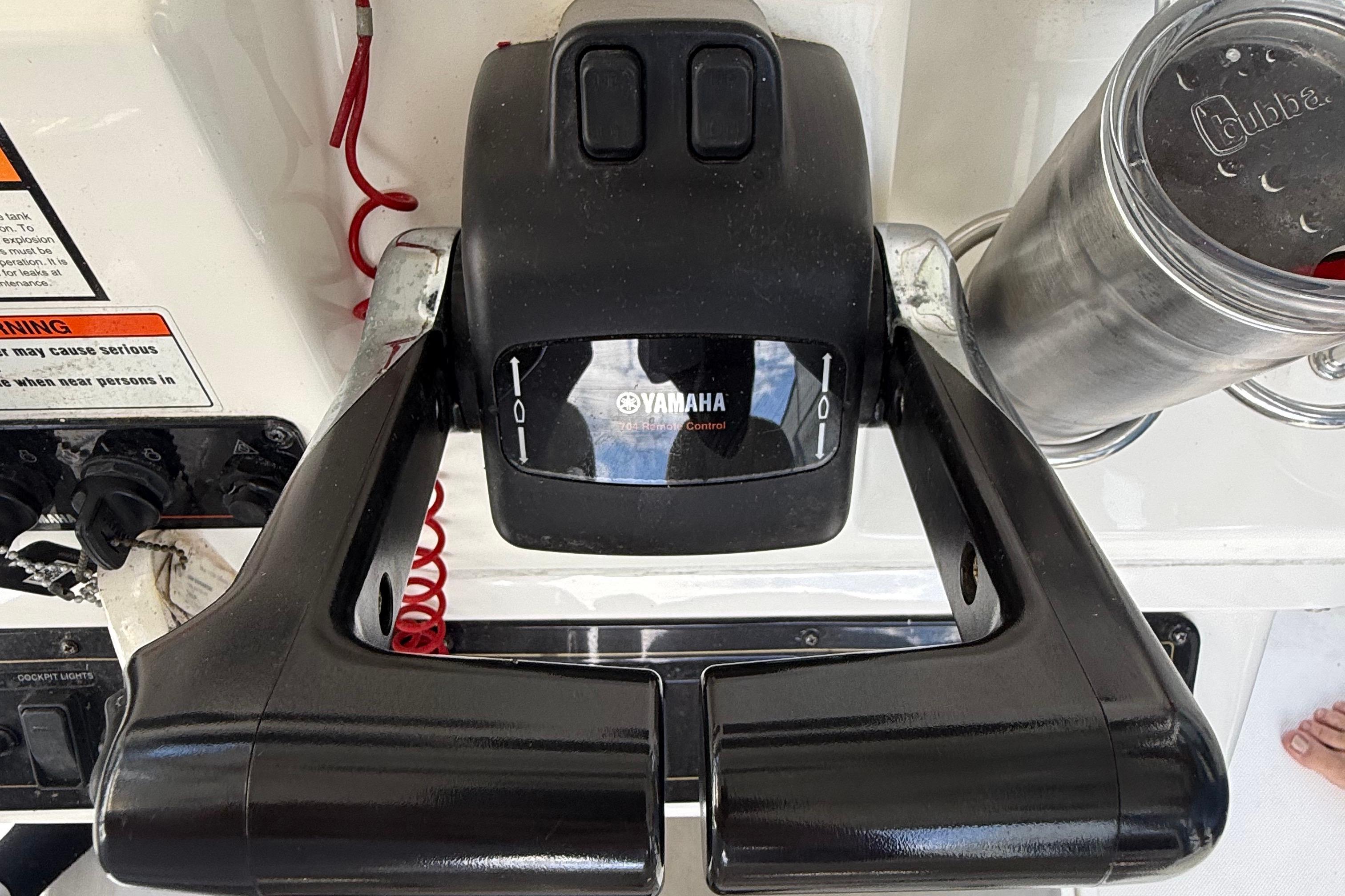 Yamaha throttle control on 2008 Century 2901 Center Console boat dashboard.