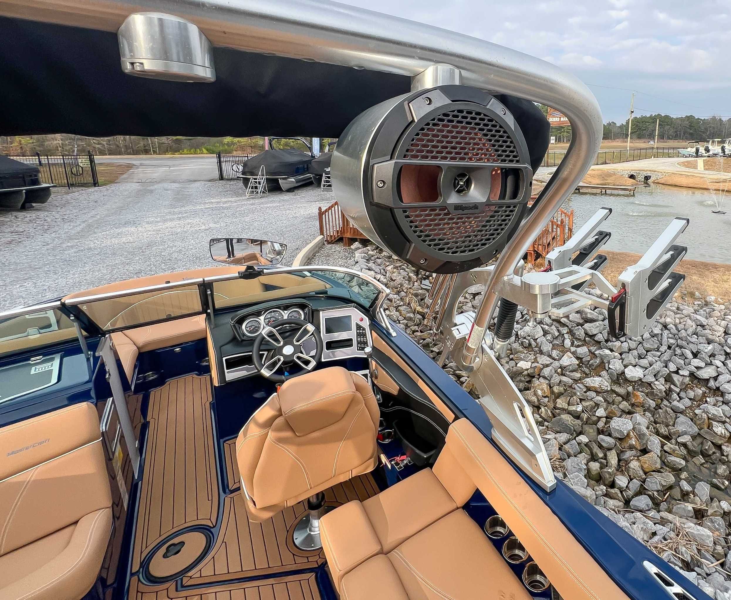 Interior of a 2021 MasterCraft XT22 boat with speakers.