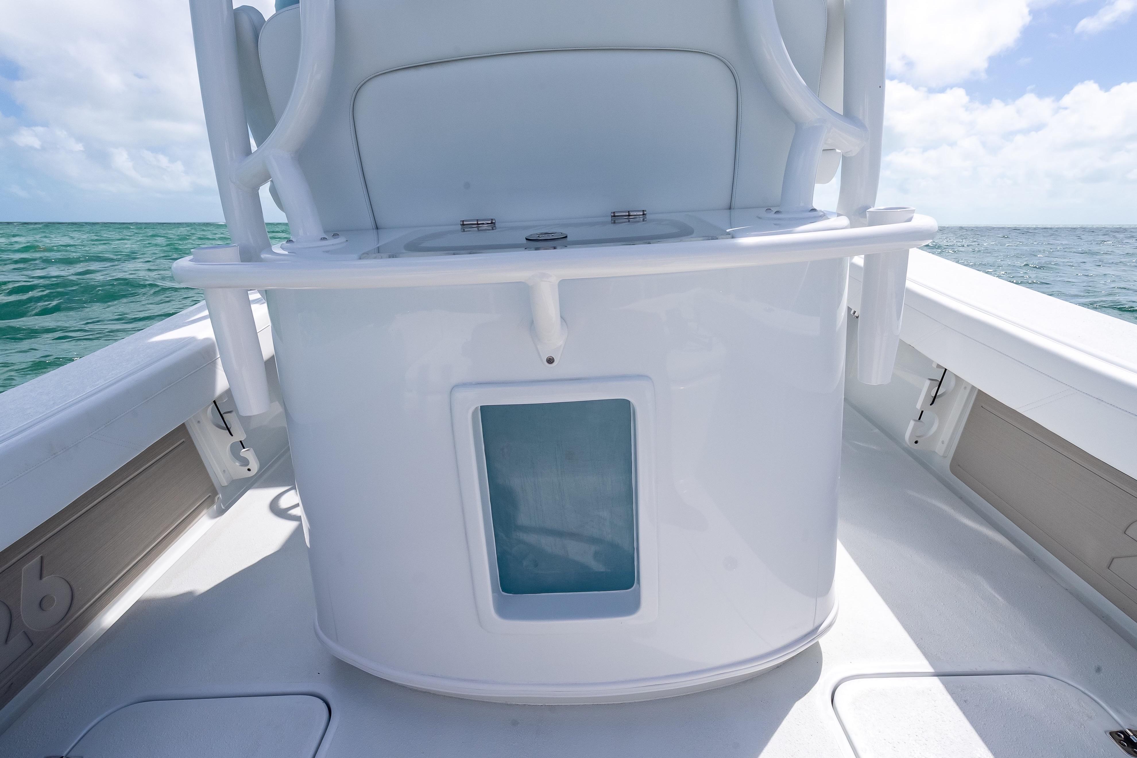 2026 Yellowfin 26 Hybrid boat console with ocean backdrop.