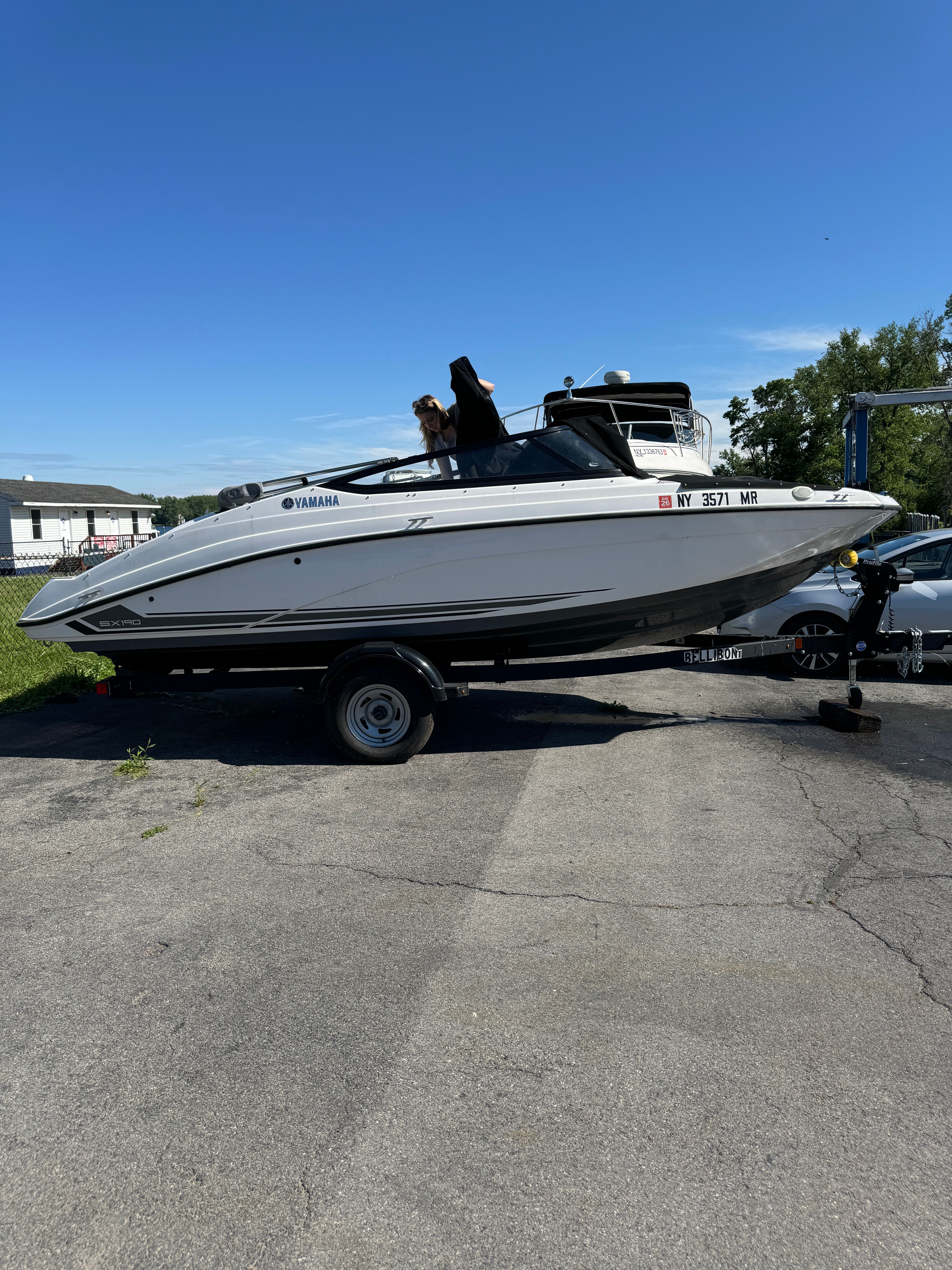 2020 Yamaha SX190 boat on trailer under sunny skies.