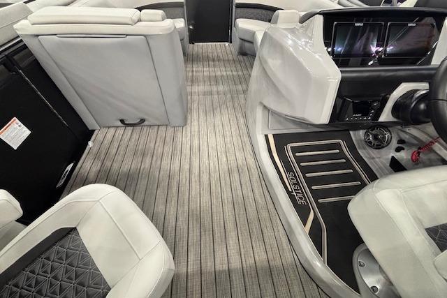 2026 Harris Solstice 230 CWDH interior with modern seating and sleek dashboard design.