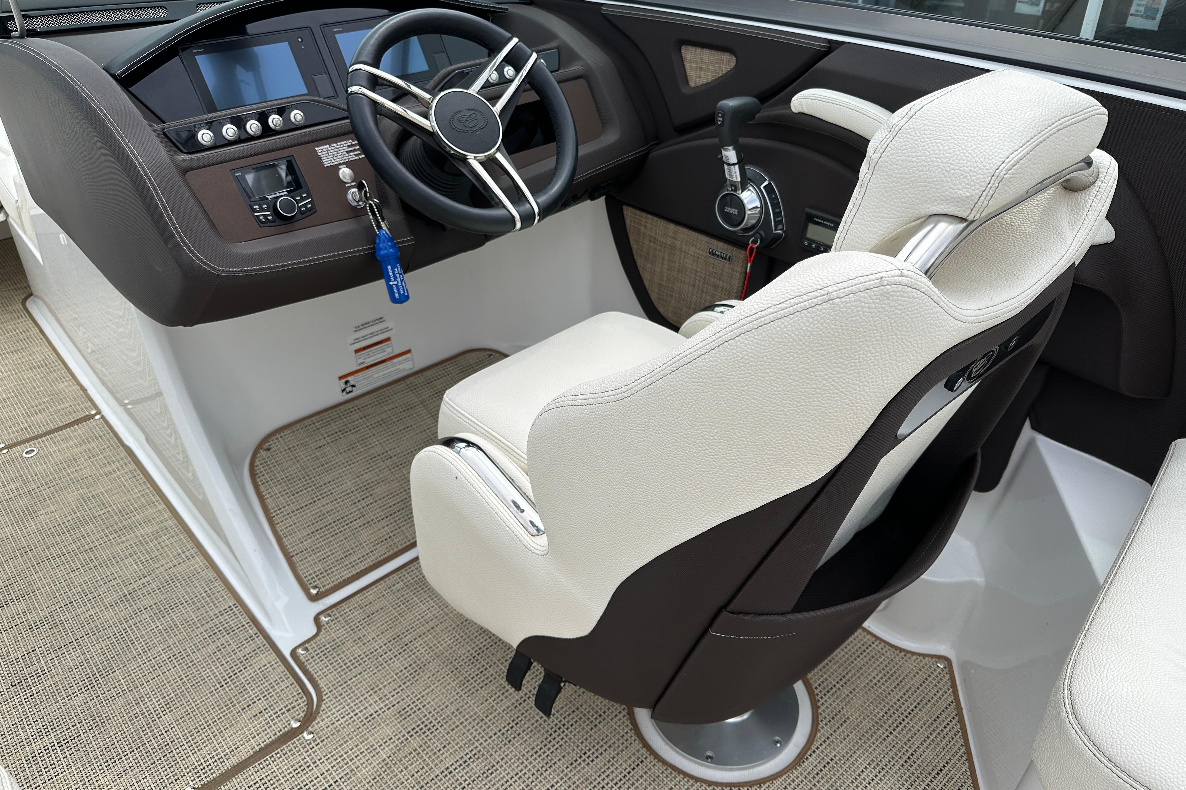 2019 Cobalt R5 boat cockpit with steering wheel and control panel.