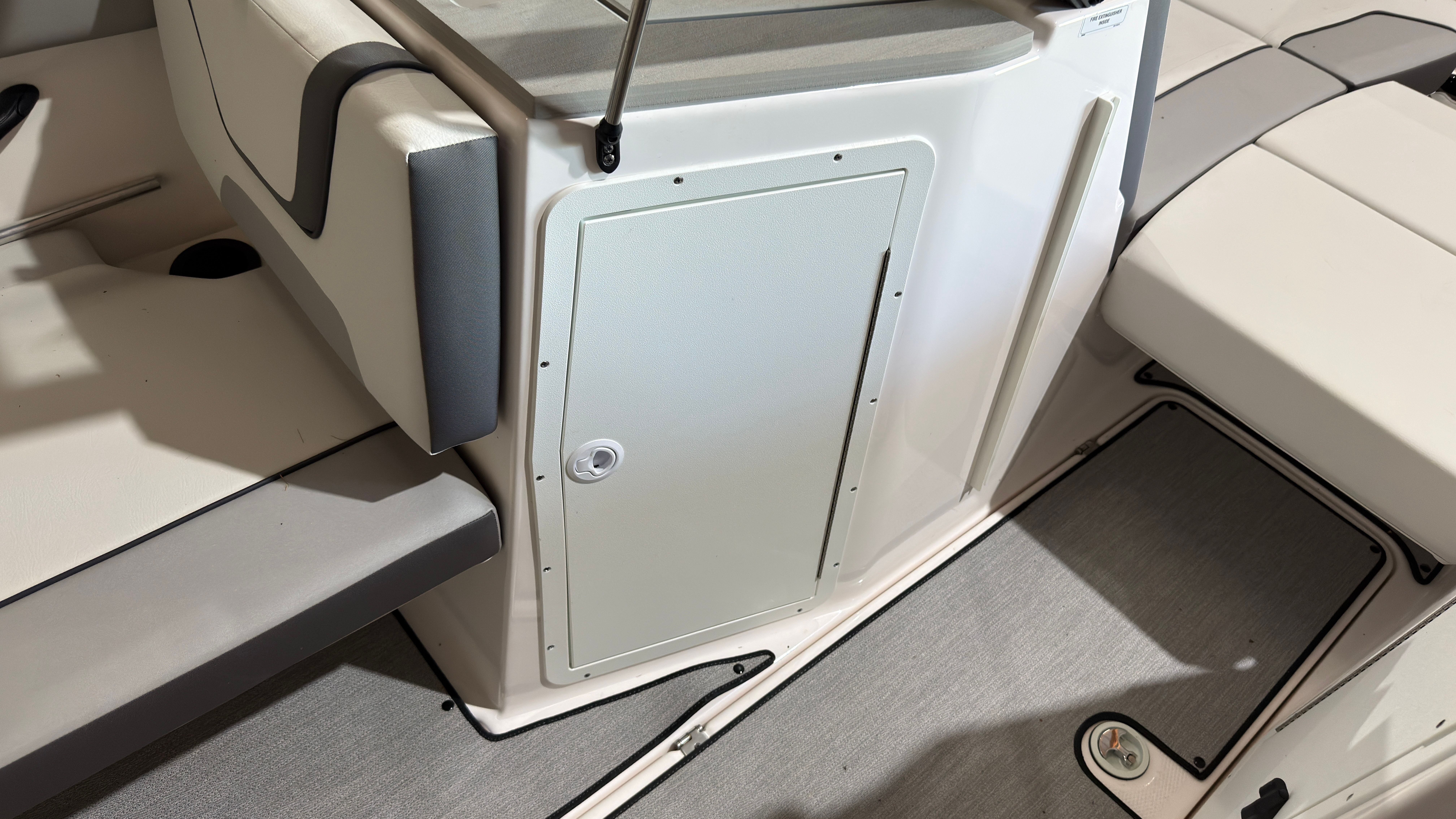 Interior of 2024 Yamaha Boats AR220 with seating and storage area.